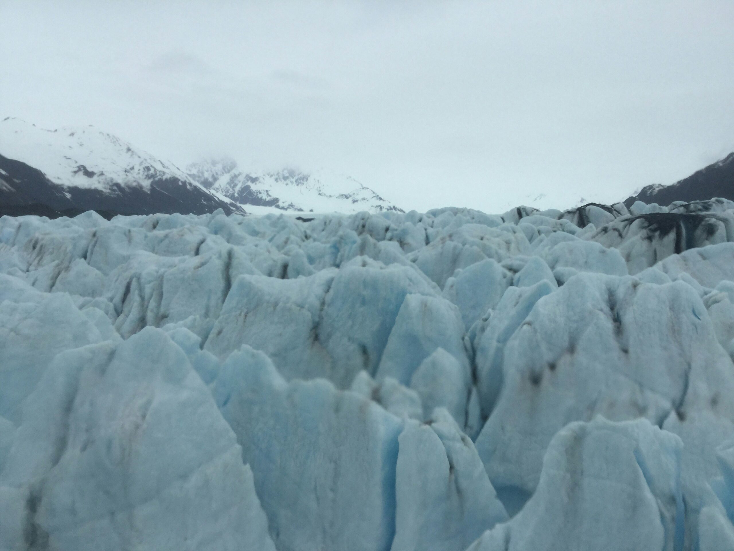 snow rocks under white sky